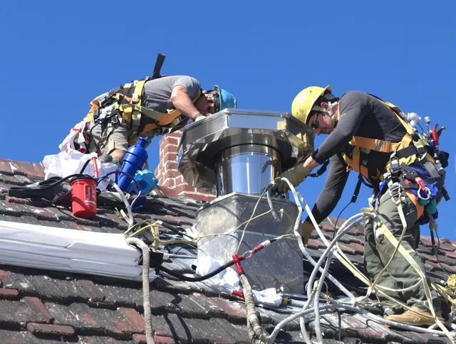 Protective chimney cap installed by Country Club Chimney Sweep in Country Club, FL