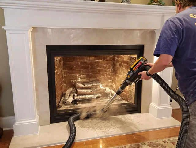 Fireplace cleaning performed by Country Club Chimney Sweep in Country Club, FL
