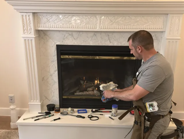 Country Club Chimney Sweep performing fireplace maintenance in Country Club, FL