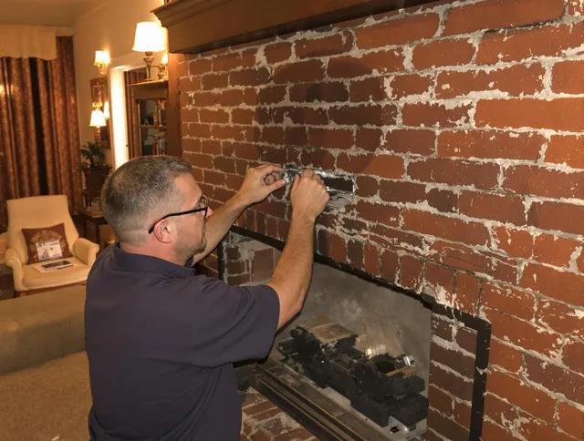 Country Club Chimney Sweep expert fixing a fireplace in Country Club, FL